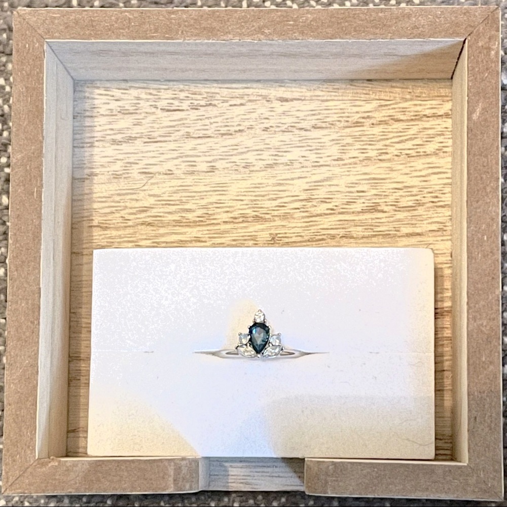 Simple, Elegant Ring with Pear-Shaped Denim Blue Colored Stone